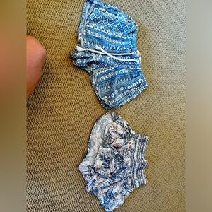 Two pairs of women’s flowy shorts.